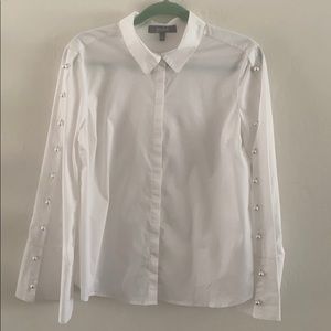 Women’s white button up pearl accent top